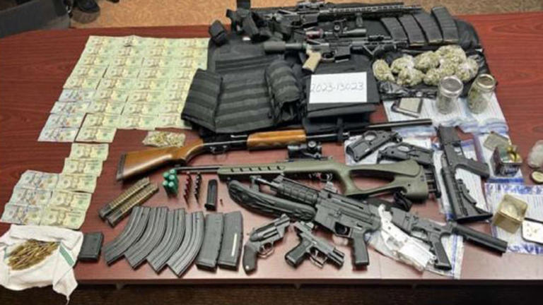 Authorities say they seized 61 guns that were either in possession of convicted felons or that had been stolen.